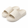 Badeschuhe 42/43 aus Synthetikschaum in Cremeweiß mit geometrischer Struktur